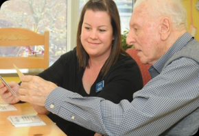 An Extendicare staff member works through "My Wishes" with a Resident.